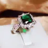 Anillo Popular Transfronterizo de Lujo Ligero Verde Pavo Real con Circonita para Mujer Lujo Estilo Europeo y Americano Circonita Esmeralda Anillo Abierto con Circonitas