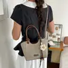 Bolso de Mano de Nicho Nuevo Verano 2026 Bolso Cubo Versátil para el Trabajo Bolso de Hombro Cruzado Elegante de Moda