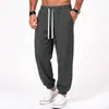 Coleção masculina nova AliExpress transfronteiriça: calças casuais de tecido canelado e sedoso, calças retas de corte solto com listras verticais e bolsos grandes