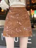 Falda corta de ante de alta gama con bordado jacquard estilo francés, nueva de cintura alta, adelgazante, anti-exposición A13436-1