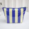 Bolsa de Maquillaje Impermeable de PVC de Nuevo Modelo Transfronteriza para Mujer, Neceser Rayado de Gran Capacidad, Bolsa de Almacenamiento de Viaje Versátil de Alto Valor