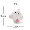 Micro-paisaje creativo lindo brisa de primavera conejito blanco figura decoración DIY accesorio de caja sorpresa adorno de escritorio