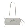 Bolsos estampados de nicho para primavera y verano para mujer, nuevo modelo 2026, versátil bolso de hombro y axila para el día a día, bolso de mano de moda, bolso baguette