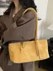 Bolso de Hombro Versátil de Moda, Bolso Tote Grande de Capacidad Vintage, Bolso de Mano de Hombro de Nicho, Nuevo de Otoño 2026 Transfronterizo
