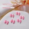 Nail art liga joias creme rosa tridimensional amor Bow Cross urso unha decoração acessórios atacado
