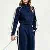 Conjunto deportivo casual transfronterizo para mujer, nuevo estilo otoño e invierno, conjunto de dos piezas con chaqueta de fitness de manga larga y pantalones rectos holgados que estilizan.
