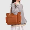 Bolso de lona transfronterizo para mujer, nuevo estilo 2026, gran capacidad, bolso tote simple, bolso de mano para el trabajo, bolso de hombro, versátil