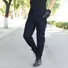 Pantalones de entrenamiento gruesos de color liso con felpa interior para invierno al por mayor, resistentes al desgaste, protección laboral, a prueba de frío, holgados, para tallas grandes, soldadura