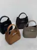 Bolso Cubo Texturizado Estilo Coreano Principios de Otoño para Mujer 2025 Nuevo Popular Bolso de Mano Elegante Estilo Extranjero Versátil para Viajar y Uso Diario Bolso Cruzado