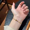 Pulsera de Anillo Corredizo Cruzada Exquisita Retro Francesa Diseño de Nicho Moda Lujo Ligero Gama Alta Simple Versátil Joyería
