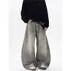 Sentido del Diseño Retro Lavado Gris Viejo Salpicadura de Tinta Cimitarras Jeans Hombres y Mujeres Marca de Moda Estilo Americano Calle Pantalones Sueltos