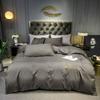 Juego Sencillo de Cuatro Piezas de Sábanas de Cama al por Mayor Bordadas Cepilladas de Lujo Ligero, Fundas de Edredón, Ropa de Cama Juego de Tres Piezas de Algodón Puro Lavado