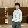 Nuevos estilos de otoño e invierno: camisetas interiores de cuello alto para niños, camisetas para niños, capas base versátiles y elegantes de manga larga para niños mayores
