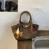 Bolso Cubo de Nicho Estilo Coreano para Mujer, Nuevo Modelo Más Vendido con un Aspecto de Alta Gama, Bolso de Hombro y Cruzado de Moda Tendencia con Patrón de Lichi