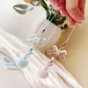 Estilo Ins Estilo Coreano Transparente Puntos de Polka Lazo Lanyard para Teléfono Móvil Llavero de Bola de Pelo Colgante para Bolso de Corazón