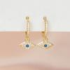 Pendientes de ojo de diablo con clip para la oreja, estilo transfronterizo europeo y americano, con hebilla de circonita azul tinta, para mujer.