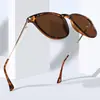 Óculos de Sol Clássicos Europeus e Americanos com Armação Oval Simples Moda Feminina Óculos Versáteis Armação de Plástico Masculina Haste de Metal Costura Óculos de Sol