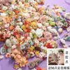 Por peso, stock sobrante de cabezas de flores simuladas, flores artificiales, pasadores para el cabello de bricolaje, materiales para coronas Hanfu, decoraciones de boda y tela de seda.