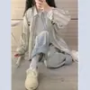 Chaqueta de camisa casual a rayas estilo francés para mujer, nuevo modelo principios de otoño 2026, top de manga larga de verano con protección solar