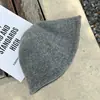 Chapéu de pescador estilo coreano para outono e inverno para mulheres, espessado e quente, lã tricotada, estilo popular online, chapéu bucket liso versátil estilo japonês ins
