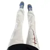 Jeans con vibra de calle americana, estampado de rayos de moda, pantalones acampanados de corte recto slim-fit para hombre, pantalones de corte curvo adelgazantes
