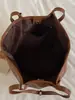 Bolso vintage de gran capacidad en color liso, nuevo modelo principios de otoño 2026, bolso de hombro simple personalizado estilo coreano casual para el trabajo y los desplazamientos