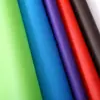Tela no tejida de polipropileno de color fabricantes de tela no tejida tela no tejida spunbond pp rollo tela a prueba de frío almacenamiento textil para el hogar a prueba de polvo