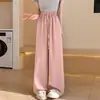 Calça feminina de verão solta casual de perna reta cintura alta com caimento e detalhes em strass, feita de seda gelada para proteção solar.