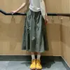 Falda de trabajo de estilo retro americano gris oscuro de cintura alta para mujer, nuevo estilo primavera 2026, corte holgado, con caída, favorecedora de la figura, falda tipo paracaidista con cordón