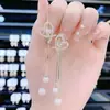Pendientes de Borla de Mariposa de Estilo Nuevo, Frescos y Elegantes, con un Toque de Alta Gama, Pendientes de Diseño Único y Etéreo 2025