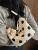 Bolso de mujer de moda de lunares de nicho estilo coreano 2026 nuevo bolso de hombro para el verano bolso de cubo pequeño elegante