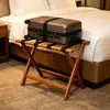 Estante de equipaje para suite de hotel de madera Estante de almacenamiento moderno Estante de equipaje plegable Estante de equipaje de madera maciza Portátil