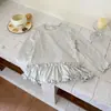Camada Base Feminina com Babado Outono 2026 Nova Camiseta Infantil de Manga Longa Poá Cor Sólida Top Interno de Alta Elasticidade
