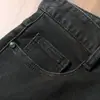 Otoño e Invierno Grueso Suave Rígido Yassel Sarga Elástico Casual Recto Ajuste Delgado Versátil Negro Gris Jeans para Hombres