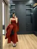 Nuevo Conjunto de Tres Piezas de Punto para Mujer Otoño/Invierno 2026, Top de Tubo + Falda de Cintura Alta + Cárdigan Largo, Estilo 'Hot Girl' de Deseo Puro