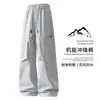 Pantalones casuales de trabajo de secado rápido para hombre, estilo primavera y otoño, duraderos, de pierna recta, adecuados para adolescentes, estilo americano, pantalones holgados para exteriores para estudiantes de secundaria.