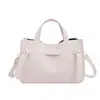 Bolso de Mano Tipo Cubo con Textura de Alta Calidad al por Mayor para Mujer 2026 Verano Nuevo Color Sólido Bolso de Hombro Simple Bolso Cruzado para el Trabajo