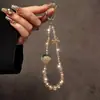 Nueva Cadena para Teléfono Móvil Cadena Colgante de Cristal Diseño de Gama Alta Pequeño Nicho Sentido del Diseño Exquisito Correa Colgante de Muñeca para Mujer Accesorios para Bolsos