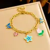 Pulseira de Corrente em Aço Inoxidável com Pingente Banhado a Ouro, Flor Azul Degradê com Gotejamento de Óleo, Cor Contrastante, Estilo Coreano