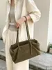 Otoño/Invierno 2026 Nuevo Estilo Coreano Vintage Casual Gran Capacidad Bolso de Hombro Único Tipo Almohada Versátil Simple para Viajes Diarios Bolso de Axila