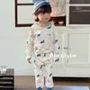 Nuevo conjunto de ropa de casa sin costuras de algodón puro con Lycra para niños, conjunto de pijama de otoño de dibujos animados Clase A para niños y niñas