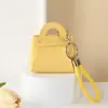 Bolsa para monedas pequeña de color caramelo linda estilo coreano, monedero, llavero para llaves, bolsa pequeña creativa de macarrón para llevar en la mano