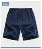 Bienes de Fujian shorts de seda helada de secado rápido para hombre de verano finos de longitud media pantalones para correr casuales deportivos holgados de cinco puntos
