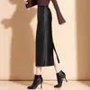 Falda de moda falda de cadera longitud media línea A falda de un solo paso otoño 2024 nueva falda de cuero PU