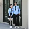 Traje de uniforme escolar estilo preppy británico uniforme escolar estudiante de secundaria camisa jk falda plisada disfraz para actuación de coro fábrica venta al por mayor