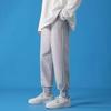 Pantalones deportivos delgados atados al tobillo de primavera y otoño verano para hombre talla grande pantalones casuales pantalones de chándal sueltos versátiles pantalones largos de moda