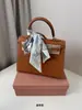 Bolso de Mano para Mujer de Alta Gama con Estilo Elegante Estampado de Palma Bolso Tipo Kelly 2025 Nuevo Bolso Cruzado de Moda de un Solo Hombro de Cuero para Mujer