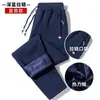 Calças grossas forradas de lã masculinas, calças esportivas largas e casuais plus size, calças de moletom da moda para atividades ao ar livre, calças retas