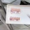 Armadura de mano Naizi chica dulce pintada a mano amor lindo ojo de gato kt lazo parche de arte de uñas al por mayor