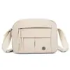 Casual Urbano 2025 Outono Nova Bolsa Feminina Versátil Casual Ombro Transversal Múltiplos Bolsos Bolsa de Pano para Mamãe Atacado